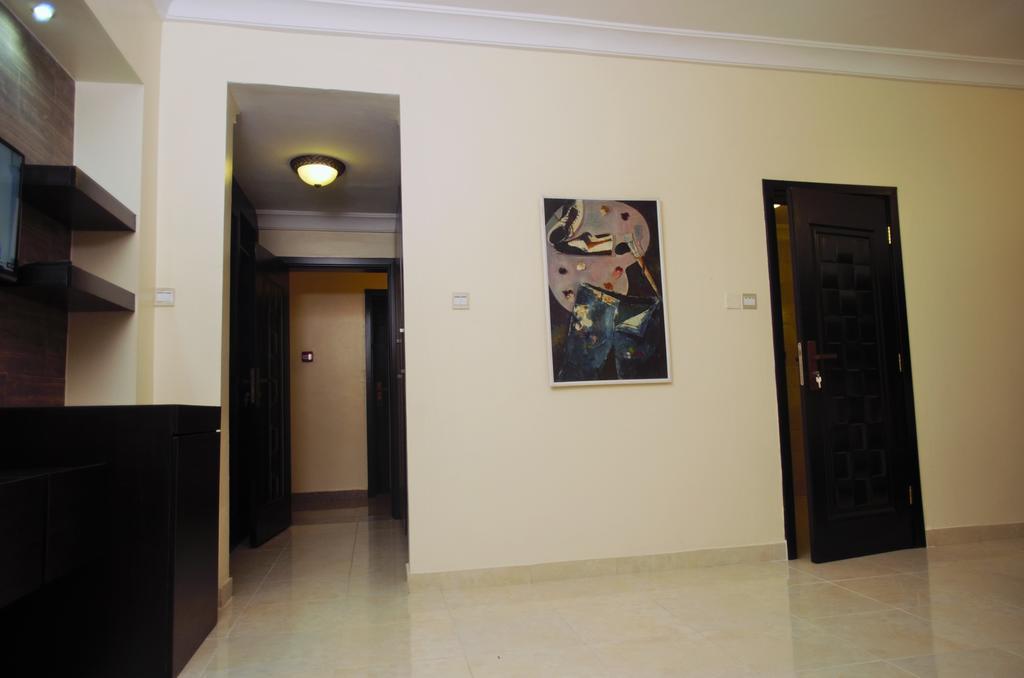 Gemini Place Apartments Лагос Номер фото