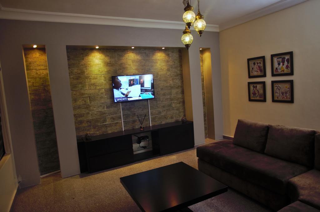 Gemini Place Apartments Лагос Номер фото