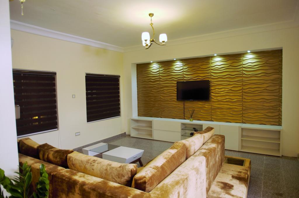 Gemini Place Apartments Лагос Номер фото