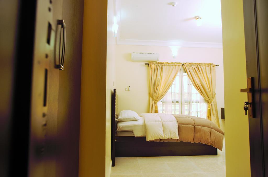 Gemini Place Apartments Лагос Номер фото