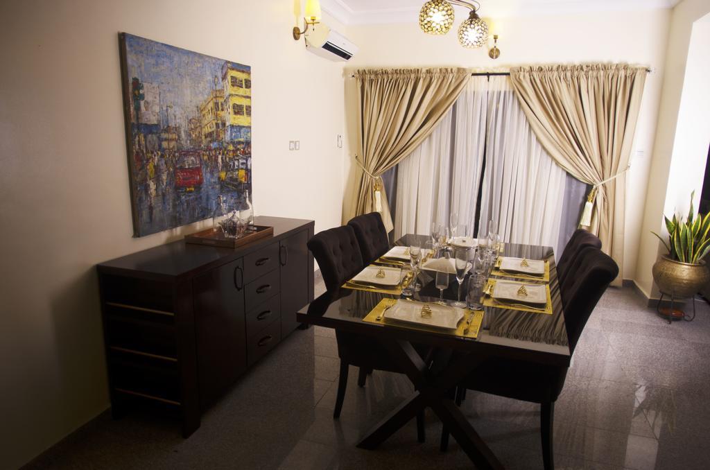 Gemini Place Apartments Лагос Номер фото