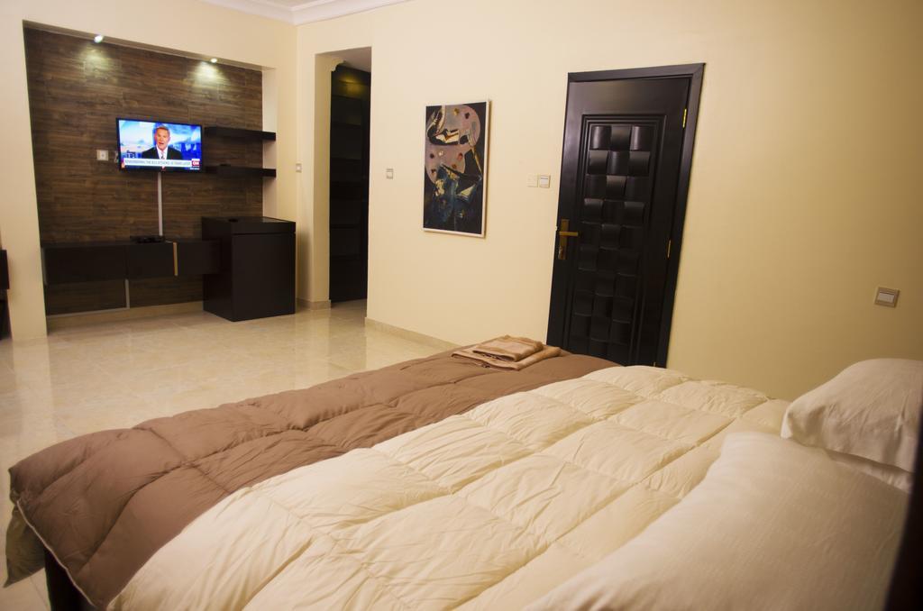 Gemini Place Apartments Лагос Номер фото